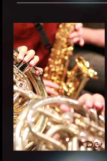 Photo by Rich Smith of French Horns and Sax. 